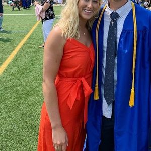 Bright red jump suit